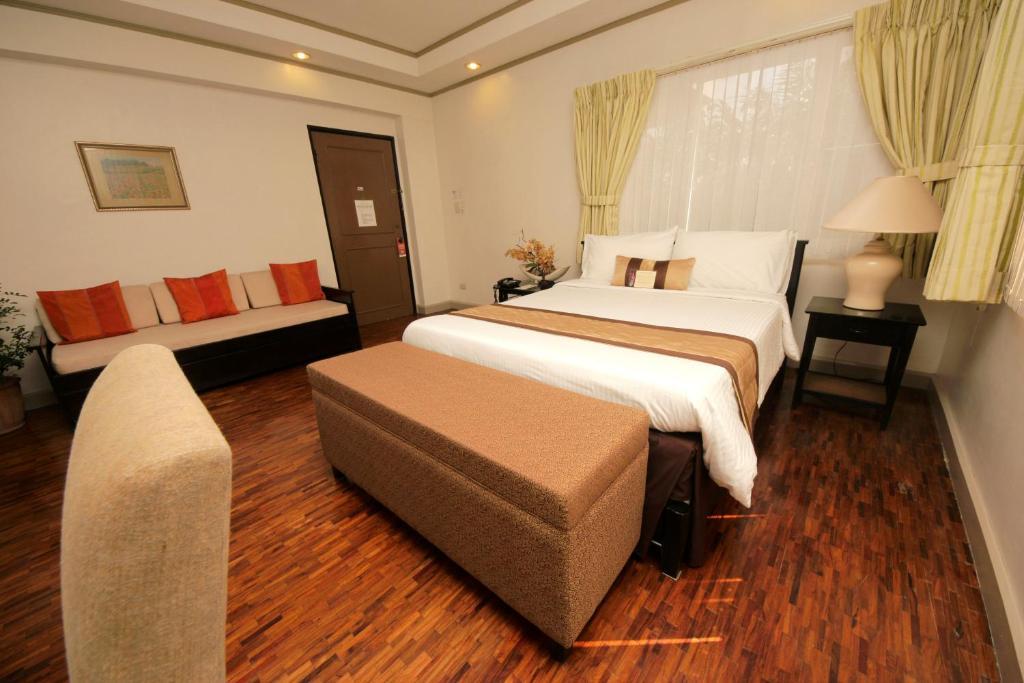 Casa Pura Inn And Suites Кесон Сити Стая снимка