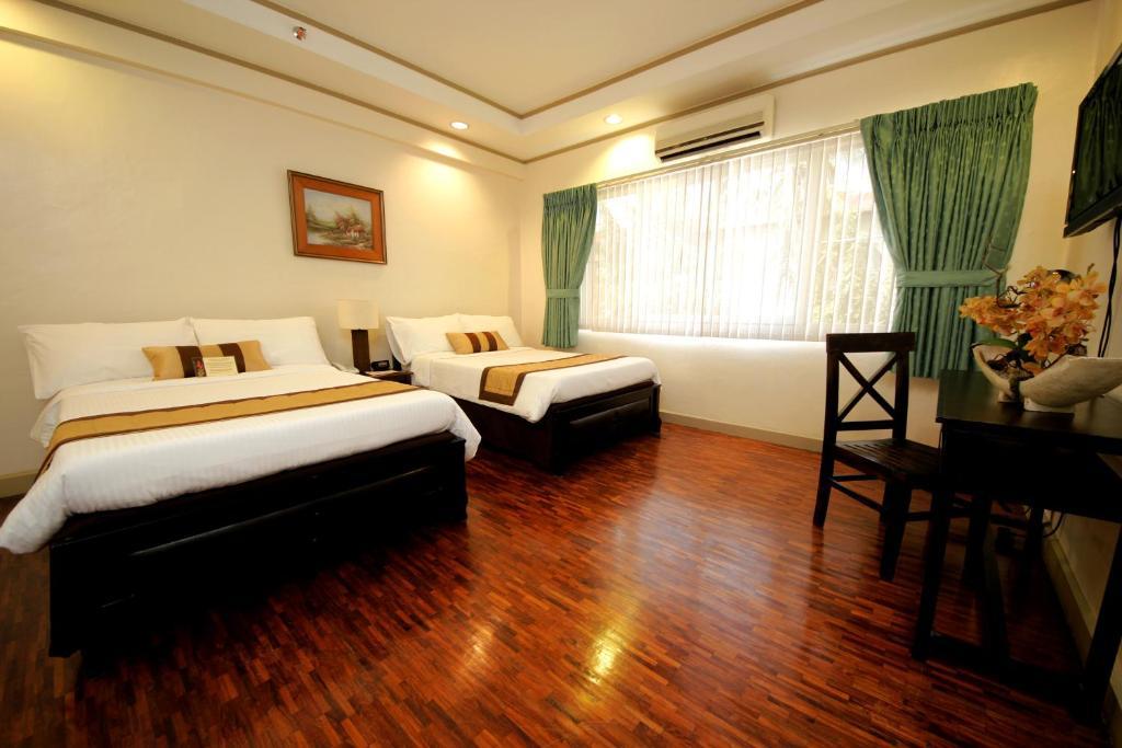 Casa Pura Inn And Suites Кесон Сити Стая снимка
