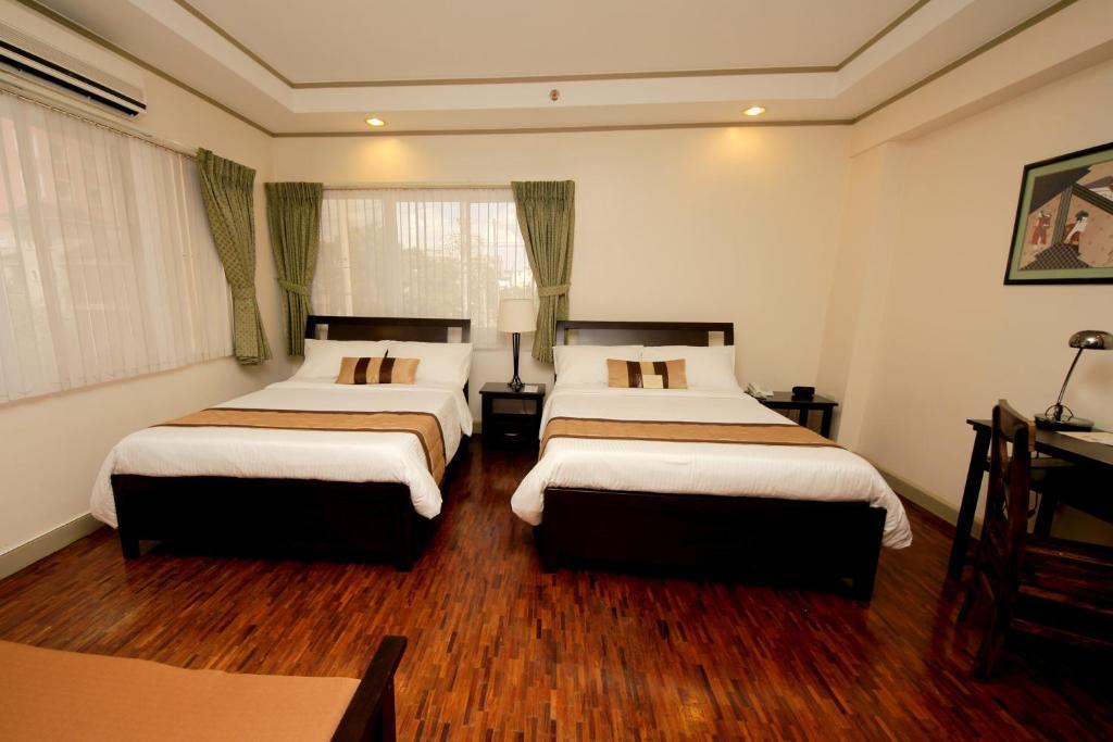 Casa Pura Inn And Suites Кесон Сити Стая снимка