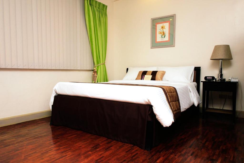 Casa Pura Inn And Suites Кесон Сити Стая снимка